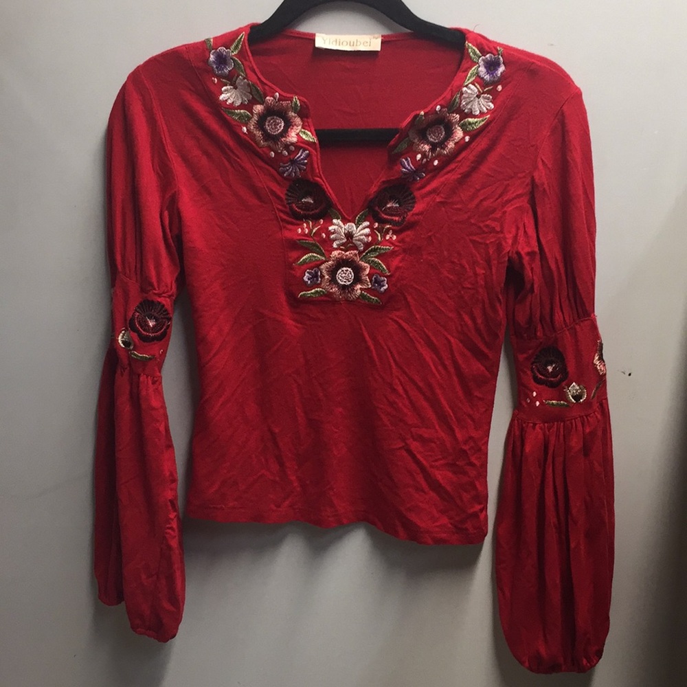 Red floral blouse